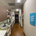 {PRACTICE_NAME} Hallway to treatment rooms